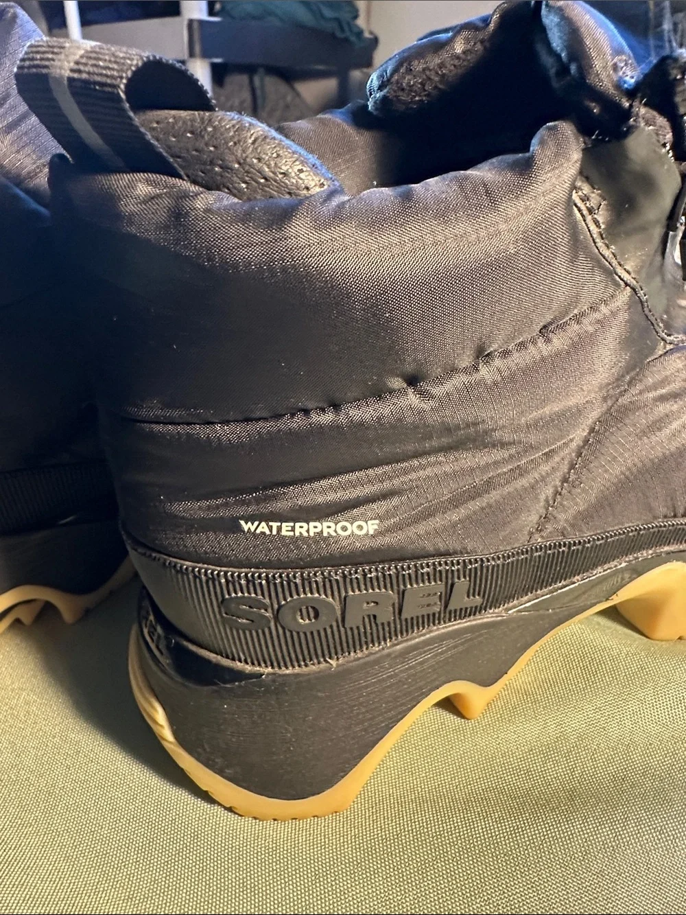 Sorel Black Puffer Ankle Booties with Tan Soles